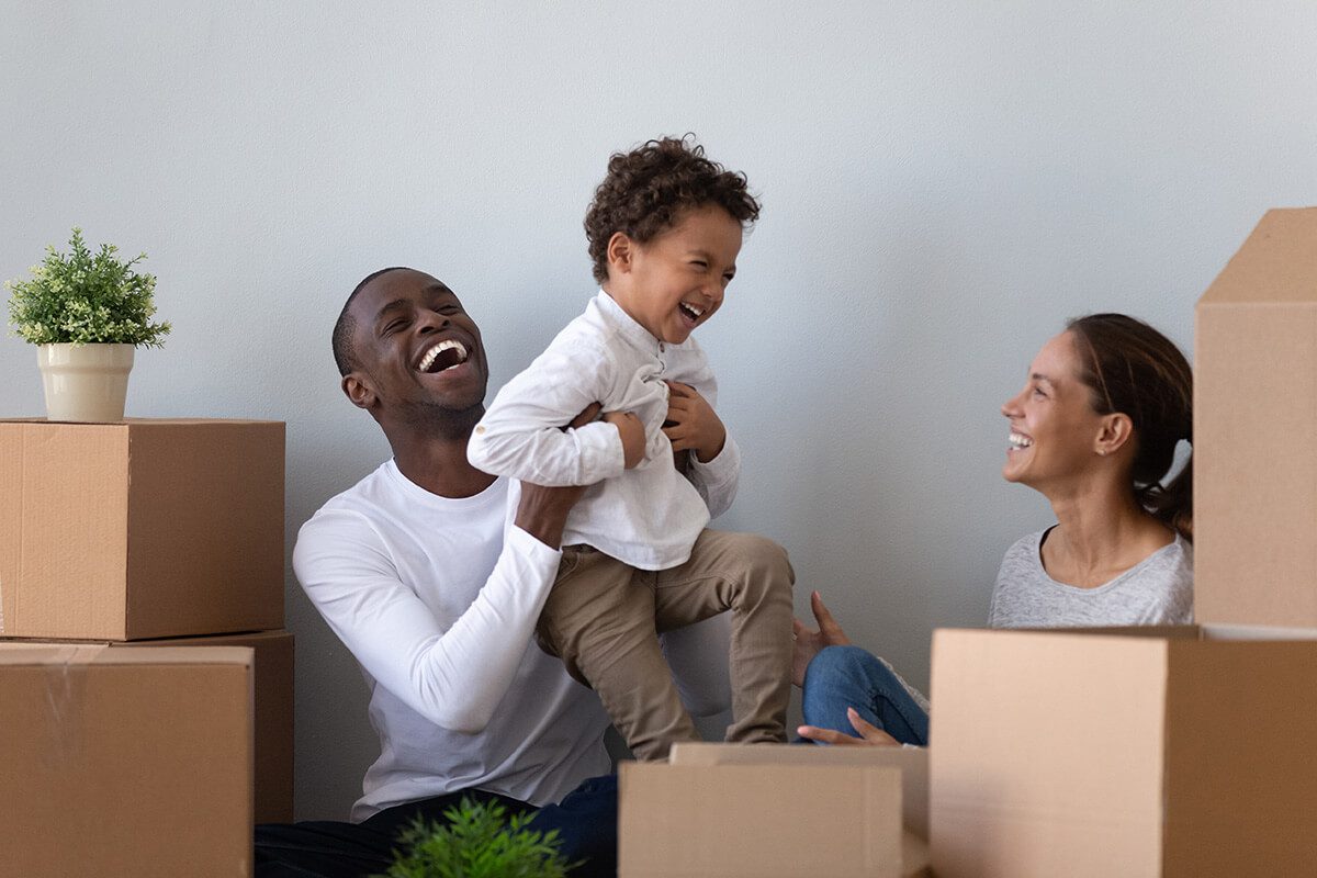 happy young couple with key in their new house