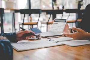 real estate agent delivering sample homes to customers